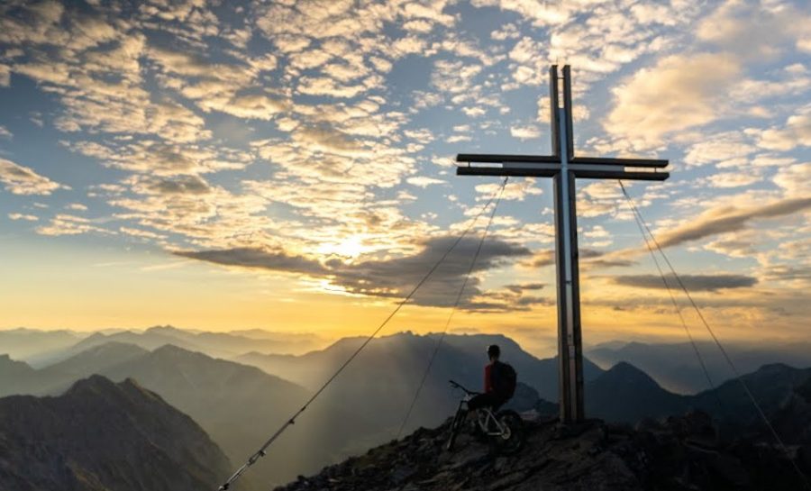 Stefan Eberharter on his mountain bike with some Crazy Riding on a Mountain Ridge Line