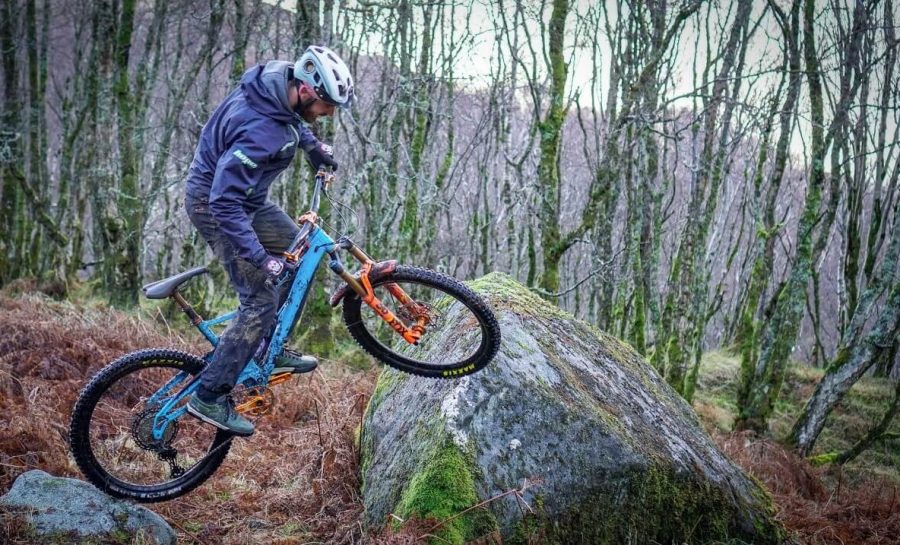 Jack Carthy rides Bike Trials on the mountain bike trails at Fort William Scotland.